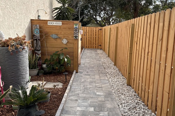 Walkway to your private backyard and suite