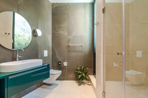 Bathtub, hair dryer, towels, soap