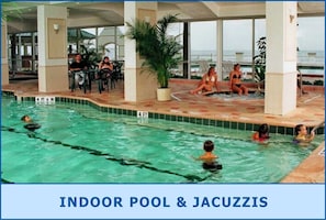 Relax and unwind in our indoor pool area, featuring a shallow end and seating for socializing.