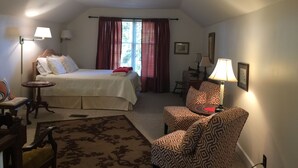 A cozy bedroom with a bed, a desk, a chair, and a window with curtains. - Yadkin Valley has the same viticulture stamp as NAPA.  Canoes and Kayaks!! (Elkin)
