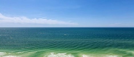 On the beach, sun-loungers