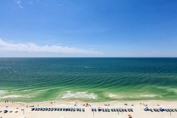 On the beach, sun-loungers