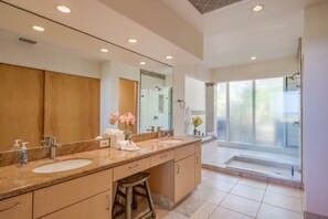 Bathtub, hair dryer, towels