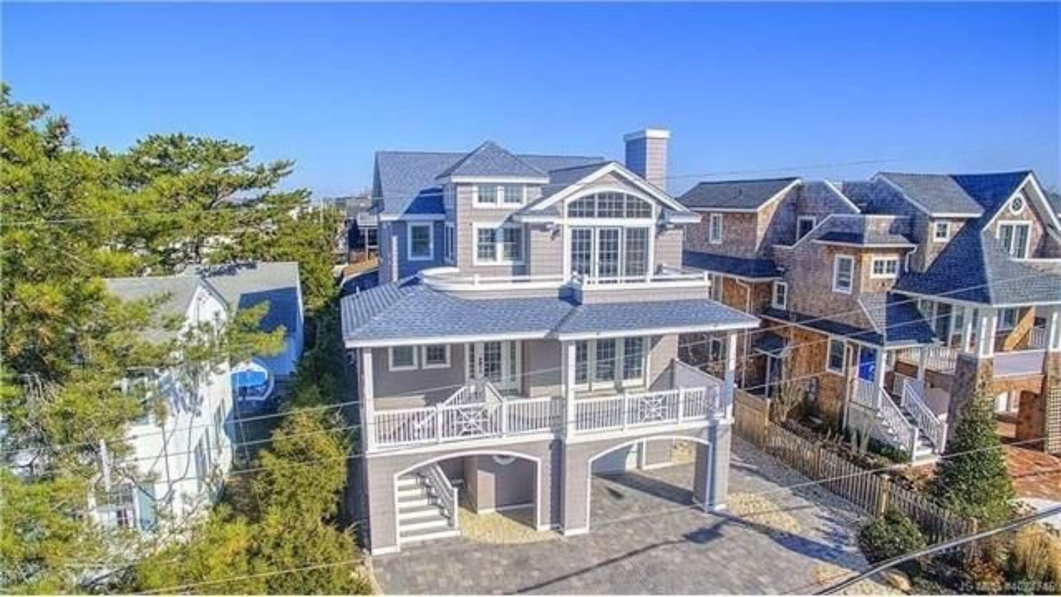 Beach Haven LEHYC new home with pool and outdoor kitchen