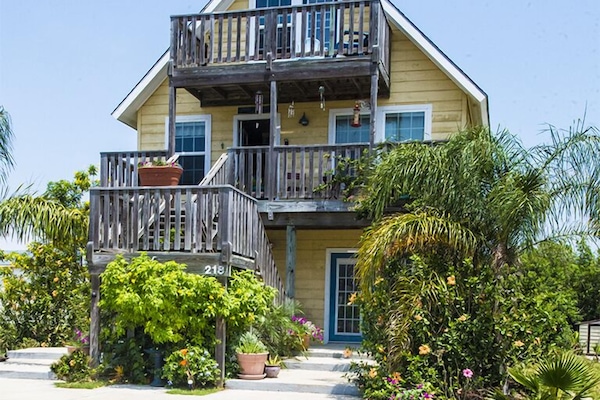 Islantime Up is the top two floors; Islantime Down is the first floor