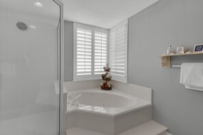 Shower, jetted tub, hair dryer, towels