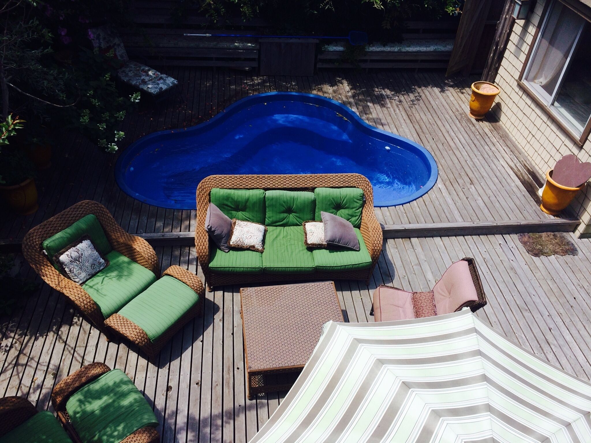 Deck w pool, outdoor shower, lounge and dining sets, Weber gas grill