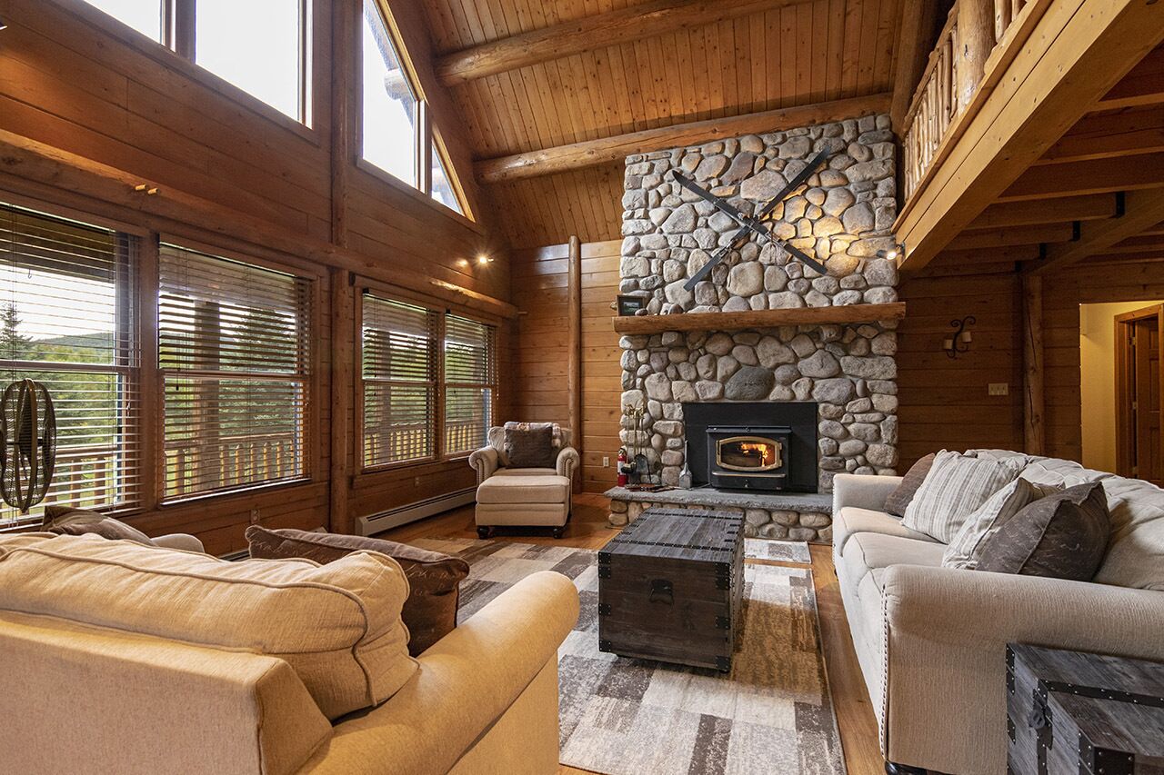 Cedar Log Home sits on 41.87 private acres with mountain and meadow views