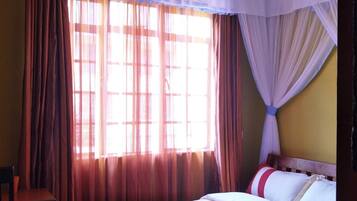 Desk, blackout drapes, soundproofing, iron/ironing board