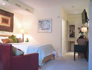 1 bedroom, desk, iron/ironing board, travel crib