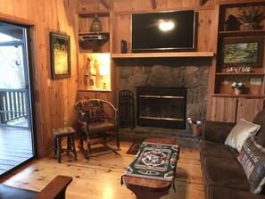 Smart TV, fireplace, foosball