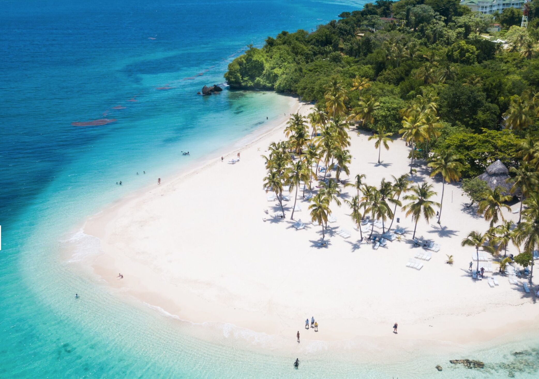 On the beach, sun loungers, beach towels