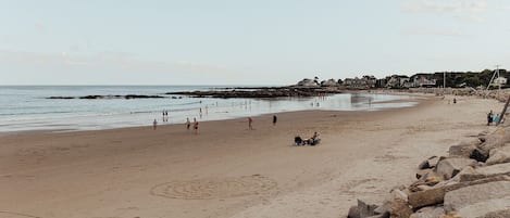 On the beach, sun-loungers, beach towels