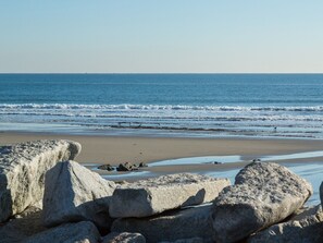 On the beach, sun-loungers, beach towels