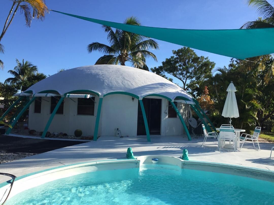 This is our home, on the opposite side of the pool from the cabin.