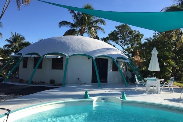 This is our home, on the opposite side of the pool from the cabin.