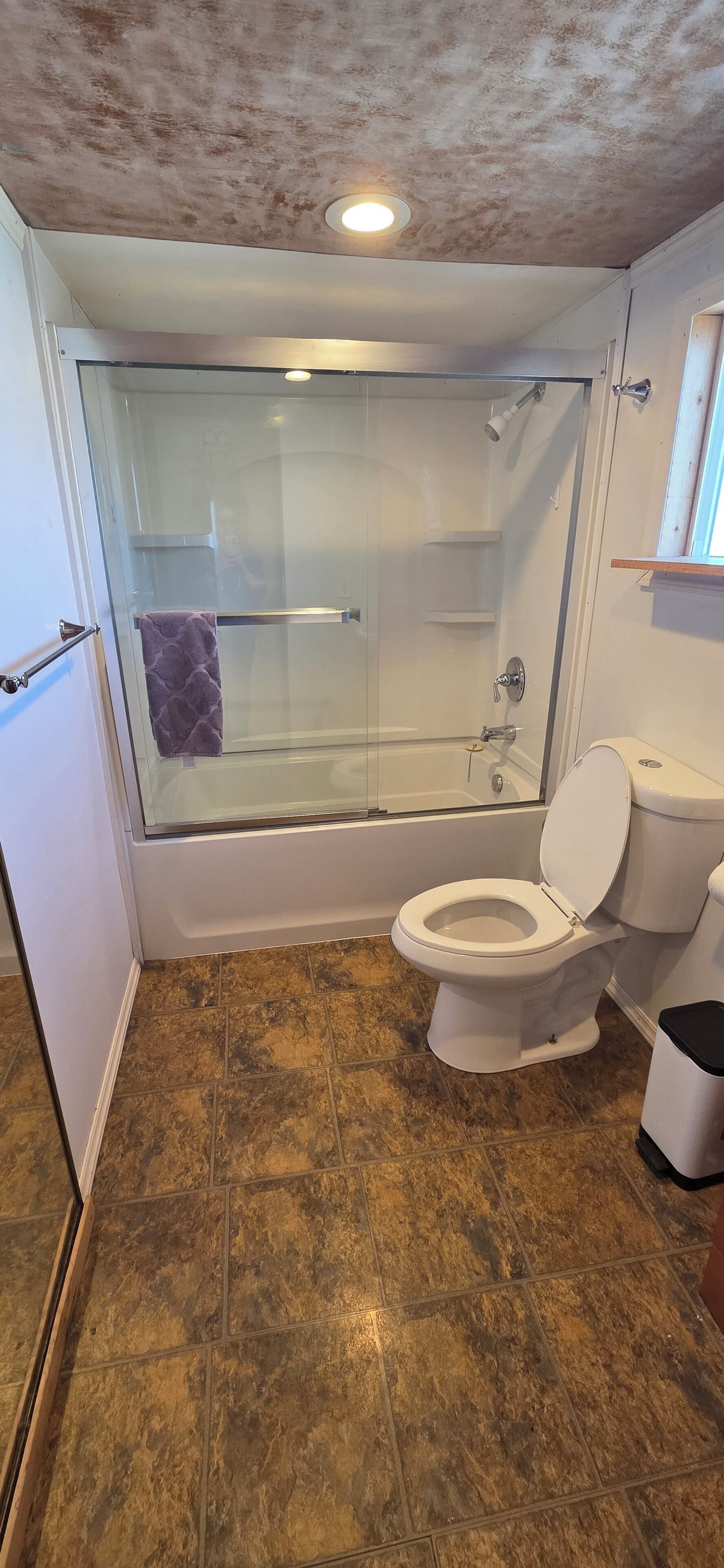 Bathtub, hair dryer, towels, soap