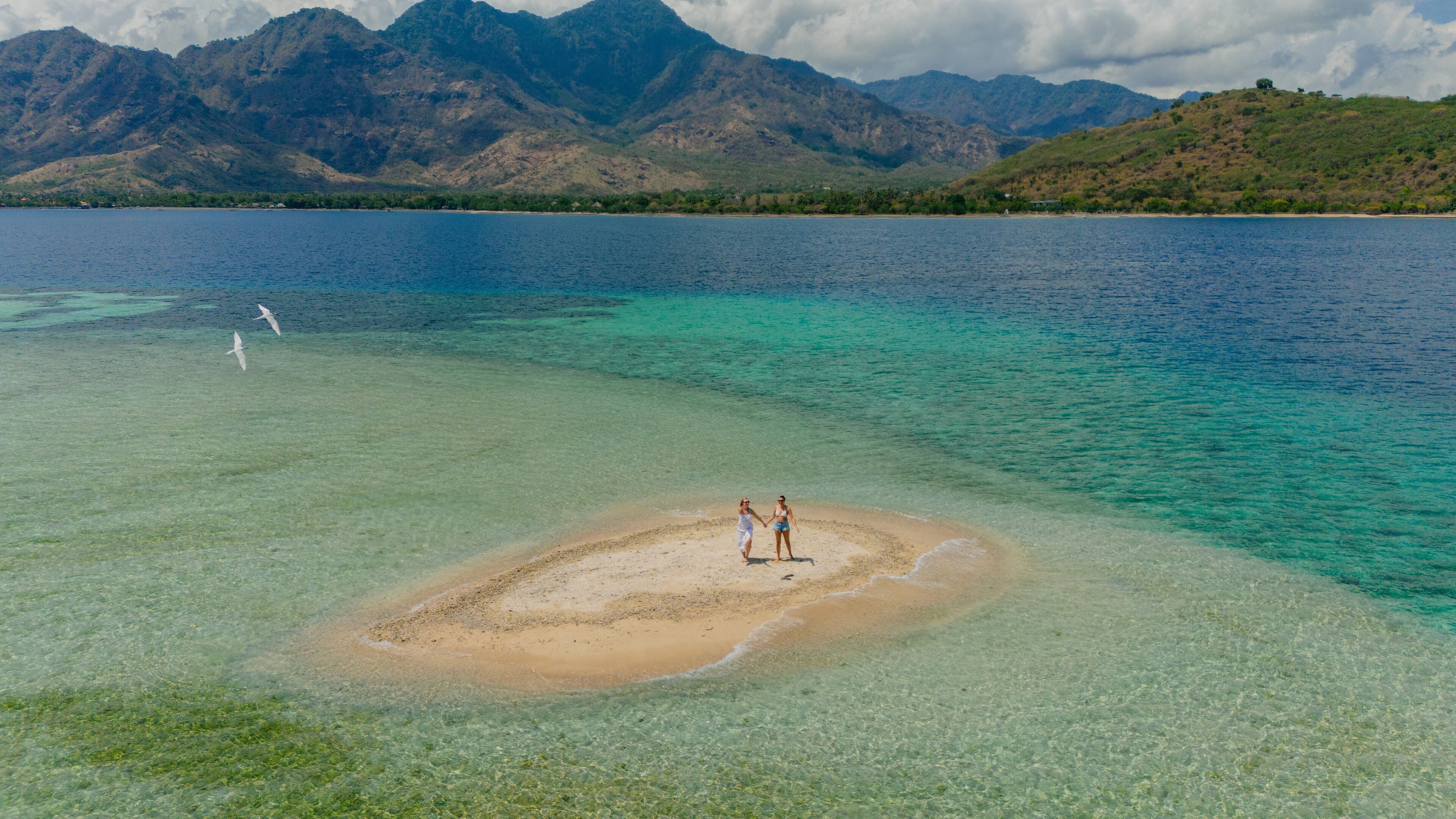 On the beach, sun loungers, beach towels