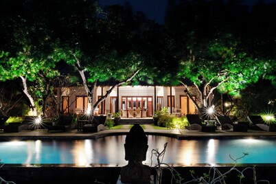 Stunning beachfront villa with pool, lush gardens, staff, and top activities!