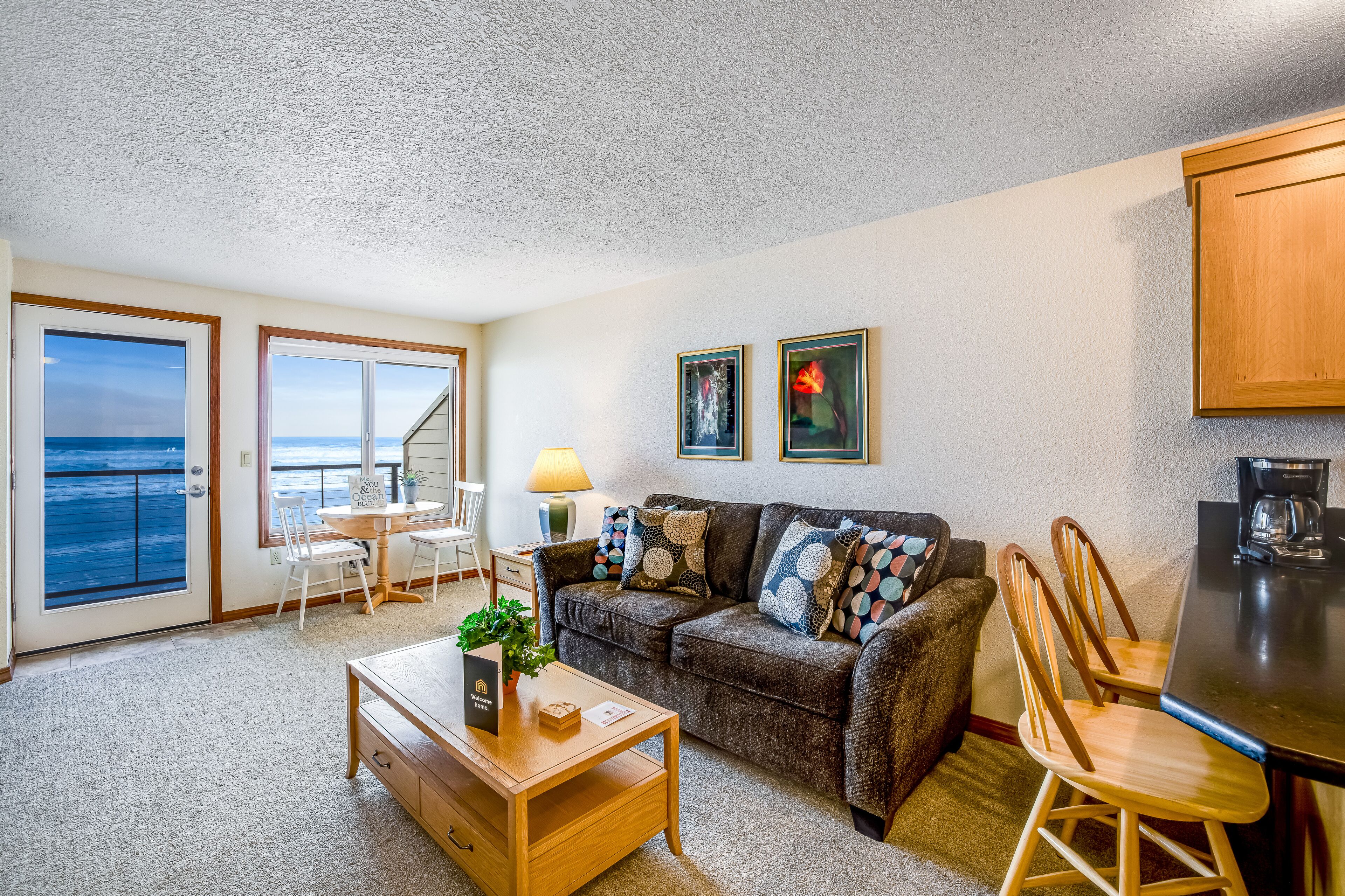 Waterfront condo w/ furnished balcony, ocean views & great location