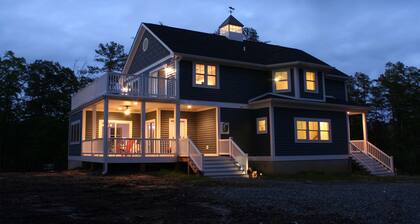 Waterfront Rivah Home with EV Charger and Gourmet Kitchen