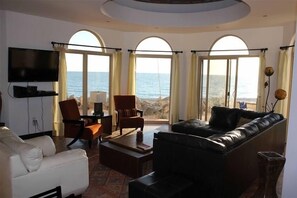 Flat-screen TV, DVD player, video library