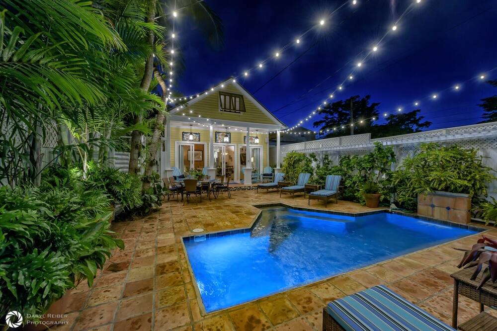 Pilar’s Secret is tucked away in the heart of Key West just half a block off famous Duval Street. This hidden oasis is the perfect spot for you to truly discover the ultimate Key West experience. Located down a quiet nondescript lane this gorgeous property is positively Key West with well appointed luxury throughout.<br><br>Pilar’s Secret offers three very spacious bedrooms, a private pool and wonderful gated outdoor living area. The fully equipped kitchen is adjacent to a large living space with plenty of room for all your guests to relax.<br><br>RELAX…<br>Pilar’s Secret was designed for sharing with family or close friends. The spacious home makes a perfect home base for a group while they enjoy everything our island has to offer. The living area has plenty of seating on plush comfortable couches and chairs. One of the living room sofas pulls out into a sleeper sofa for added guests. <br><br>The kitchen is just off the main living area with top-of-the-line appliances and all the tools you need to prepare a meal at home in between your nights out enjoying our island cuisine. There are many options for dining just a short walk from Pilar’s Secret.<br><br>YOUR OWN OASIS BY THE POOL…<br>Lush tropical landscaping and comfortable chaise lounges and chairs surround the pool at Pilar’s Secret. This very private outdoor area has seating for lunch or dinner plus ample amounts of sun and shade throughout the day for perfect outdoor living. The pool can be heated and the BBQ is right there ready for your next meal poolside or at another larger outdoor dining table alongside of the house. String lights create an enchanting space come dusk along with beautiful landscape and pool lighting. There is also an outdoor shower for rinsing off after a day at the beach.<br><br>THE ACCOMMODATIONS…<br>There are two bedrooms located on the ground level of Pilar’s Secret. One bedroom has two twin beds and the second bedroom has a king size bed, flat screen television and french doors out to the side patio. These two guest rooms share a bathroom with a glass shower and soaker tub. <br>The second floor master suite is private with a king size bed, flat screen television, en-suite bathroom and your own separate seating area. The master bath has a unique spa-like shower. This is the perfect place to get away and wind down after an active day around Key West.<br><br>THE AMENITIES…<br>Pilar’s Secret offers central A/C and heat and there are ceiling fans throughout. The private pool can also be heated upon request. The yard is private and provides lush landscape throughout. There is a BBQ grill and one private parking space. There is a Washer/Dryer, flat screen televisions in the living room and in each bedroom all with expanded cable TV. The gourmet kitchen has all the utensils for preparing your meals along with a microwave, blender, and toaster. Linens and towels are provided and housekeeping is available in the interim upon request. The home has wireless high-speed internet included. The property will accommodate up to 8 people with 3 bedrooms and a pull-out sofa. Pets are considered, please ask ahead of time. Pilar`s Secret - An oasis right off Duval Street - Sleeps up to 8