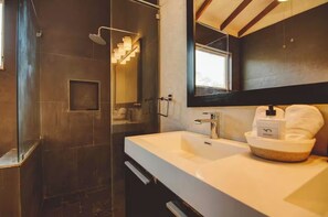 Bathtub, hair dryer, towels