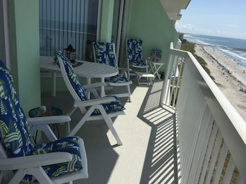 Feel the ocean breeze while relaxing on the spacious balcony.