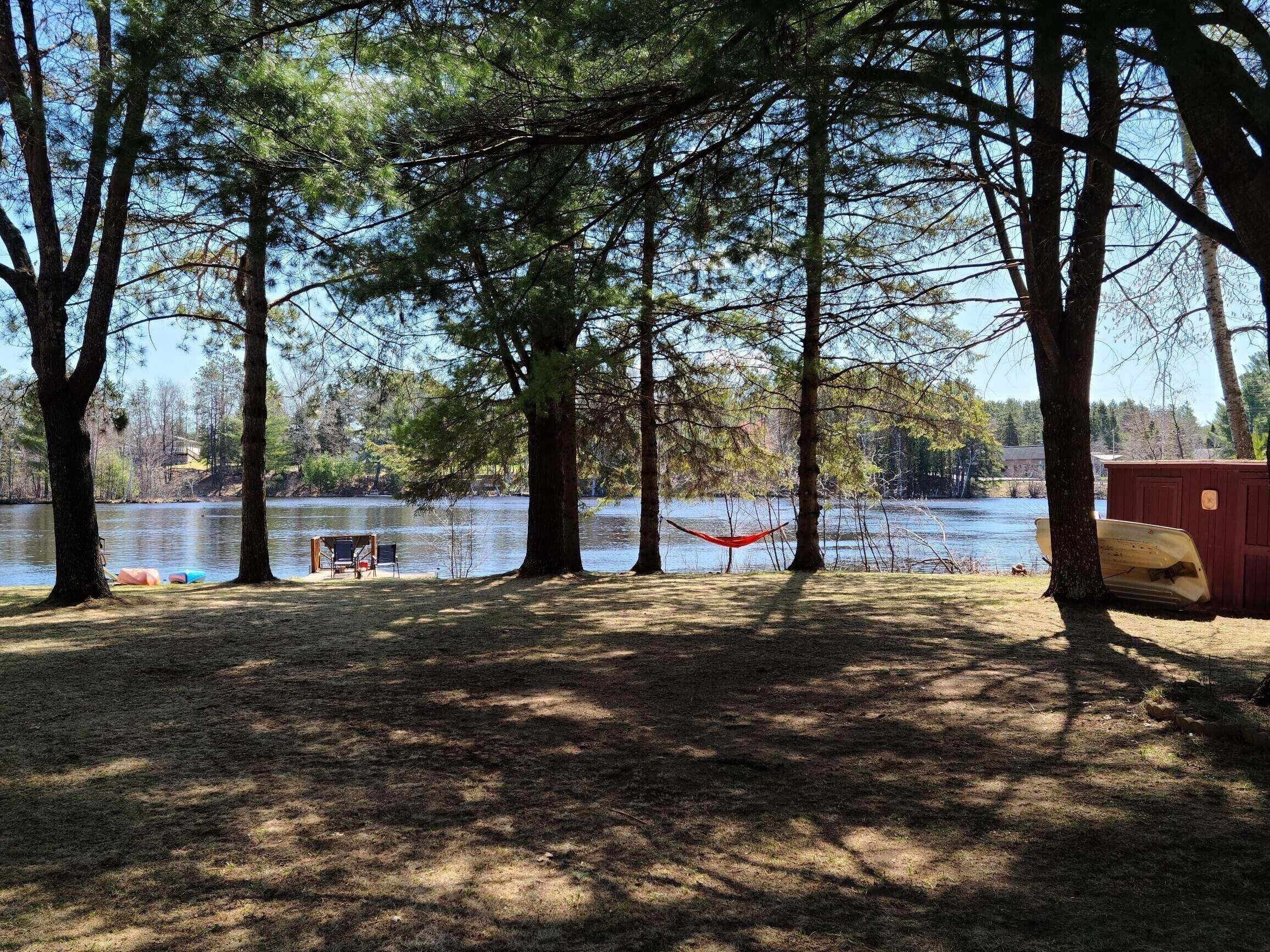 Year round home on WI River/Lake Alice, private dock, on ATV/snowmobile trail.