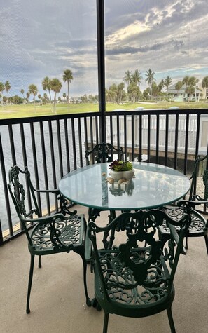 Outdoor dining - Water and Golf Course View Ocean Club Membership heated pool wifi (Stuart)