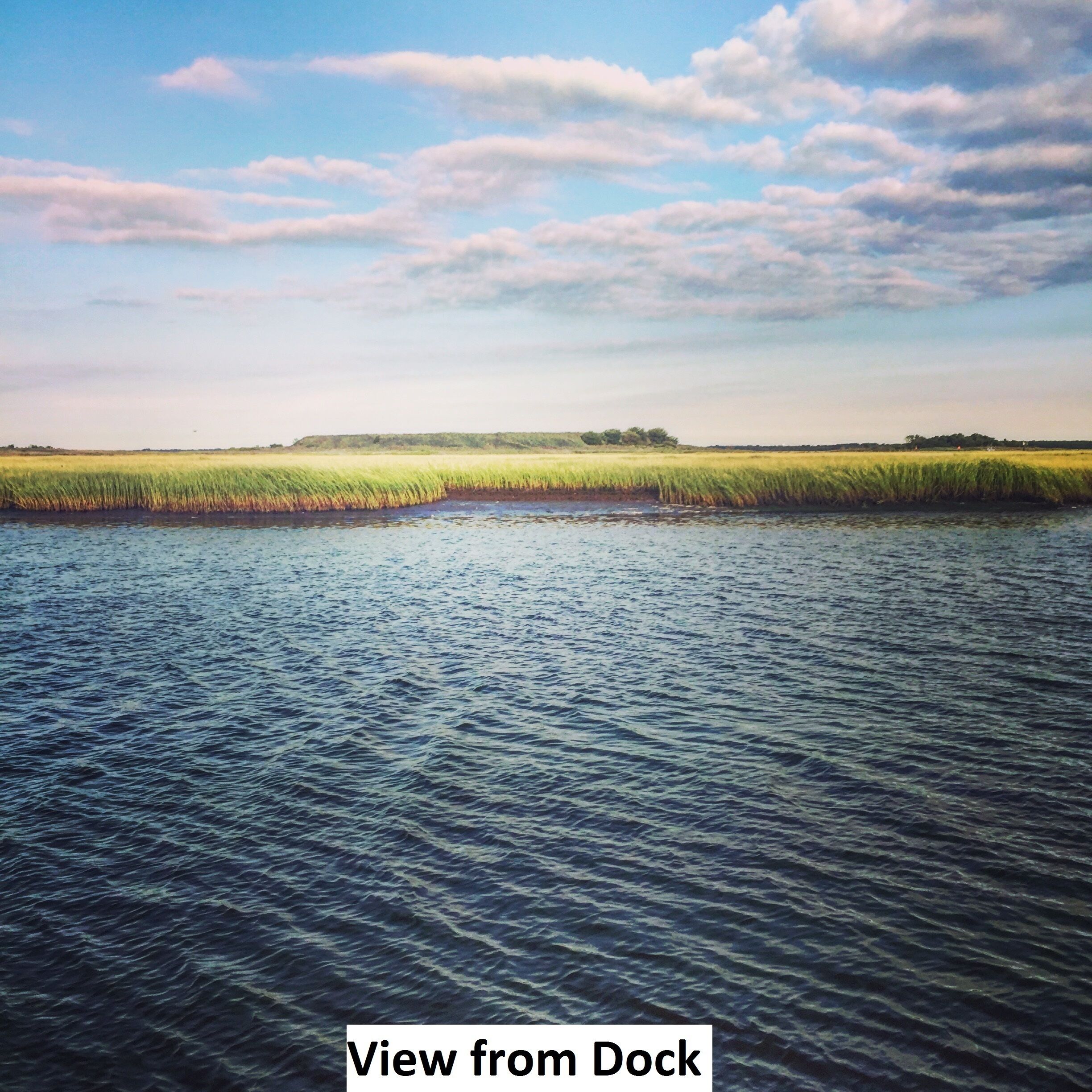 Vacation Home on Bay Front with Dock, Pet Friendly, 3 Bedrooms, Sleeps 6
