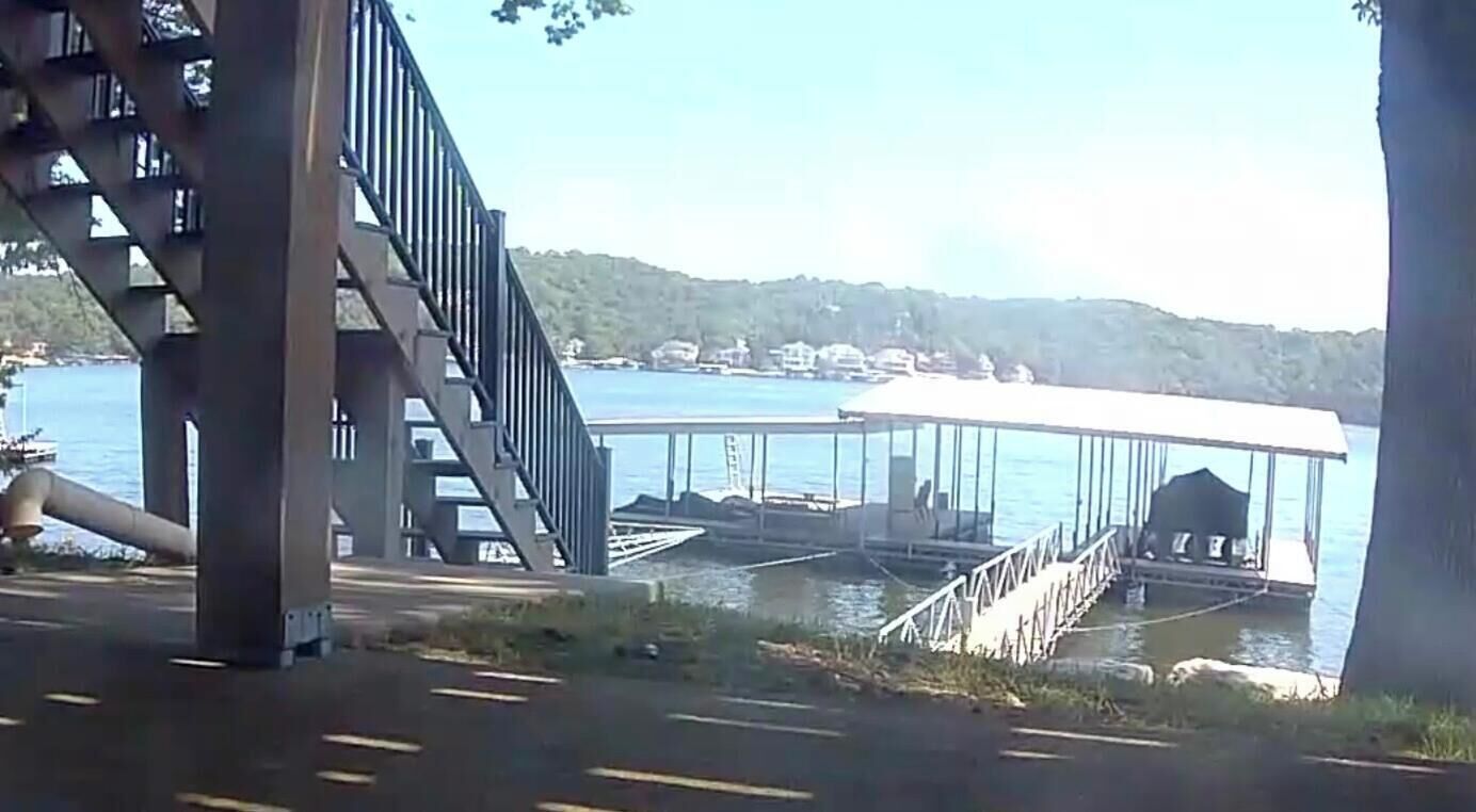 Approx 15 concrete steps to walkway of dock. 