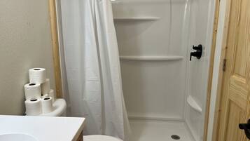 Combined shower/bathtub