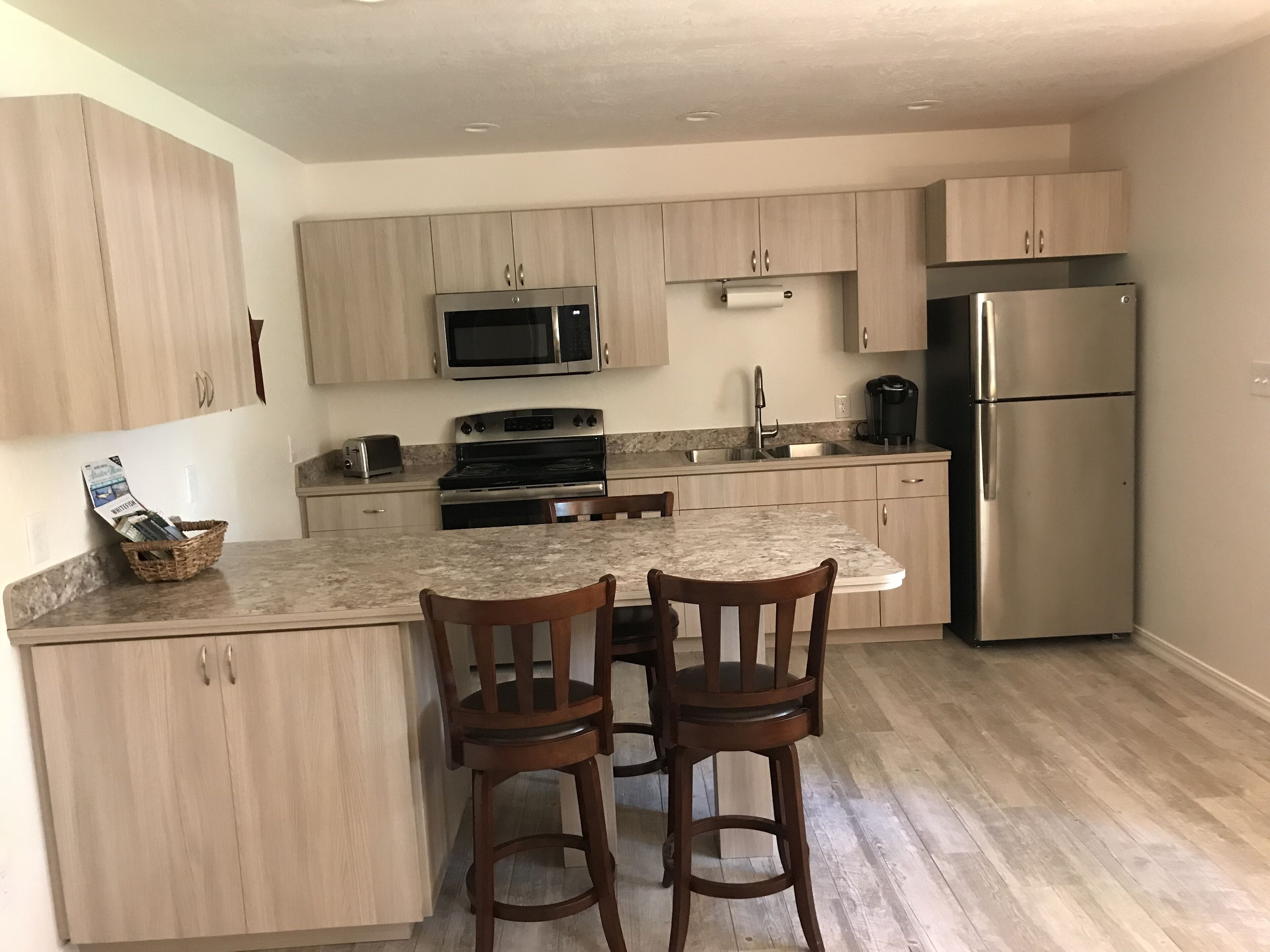 Walk out into the woods from this studio apartment located close to state lands.