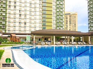 Outdoor pool - Brand New Condo (Fully Furnished) with Fast WIFI & Cable TV (Unknown)