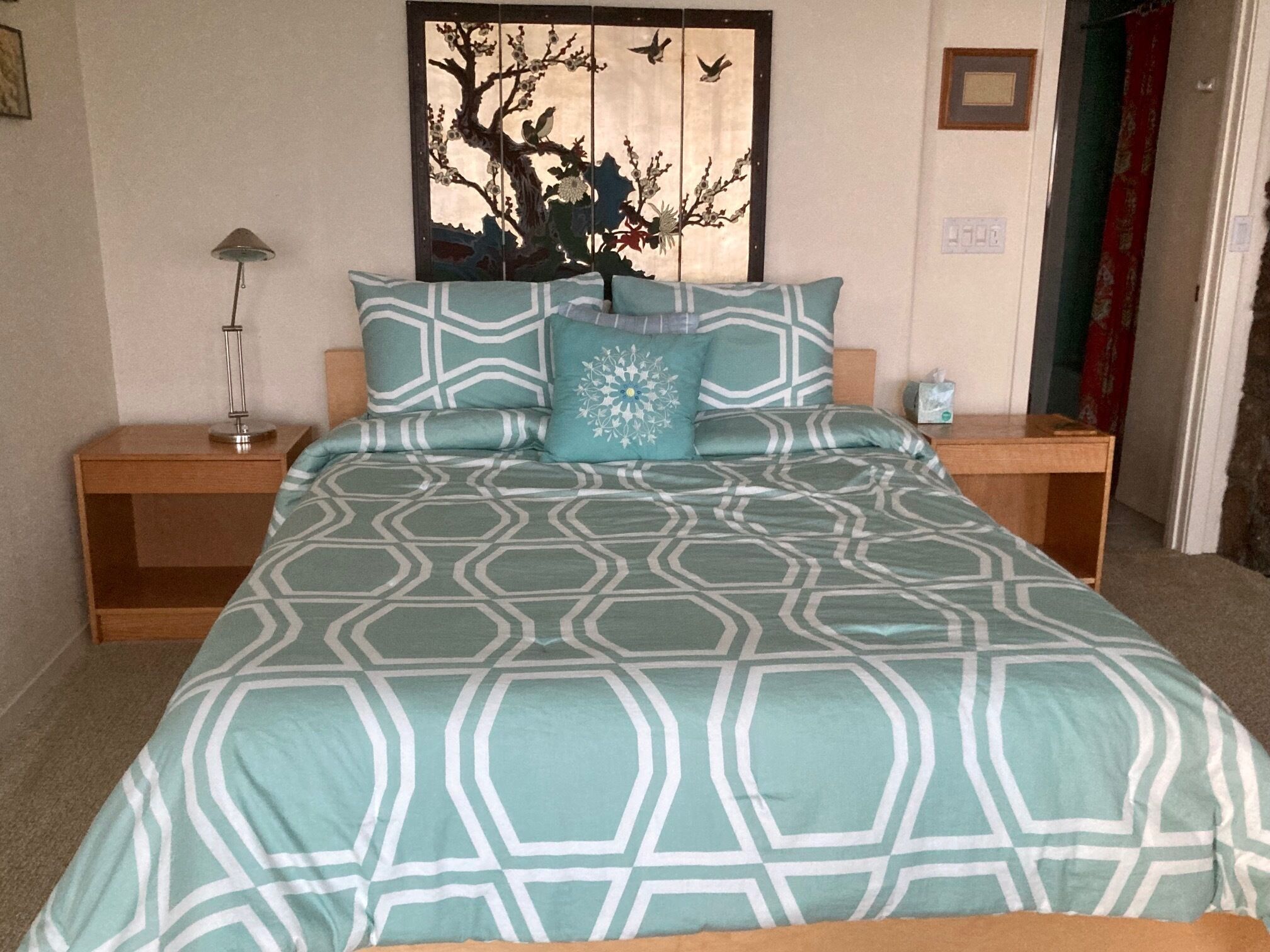 Downstairs queen-sized bed.