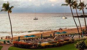 On the beach, sun loungers, beach towels