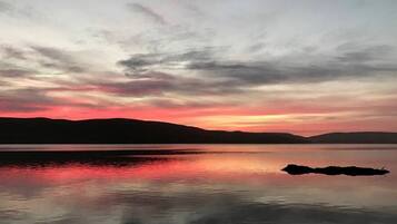 1 bedroom, desk, iron/ironing board, travel crib