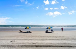 On the beach, sun-loungers, beach towels