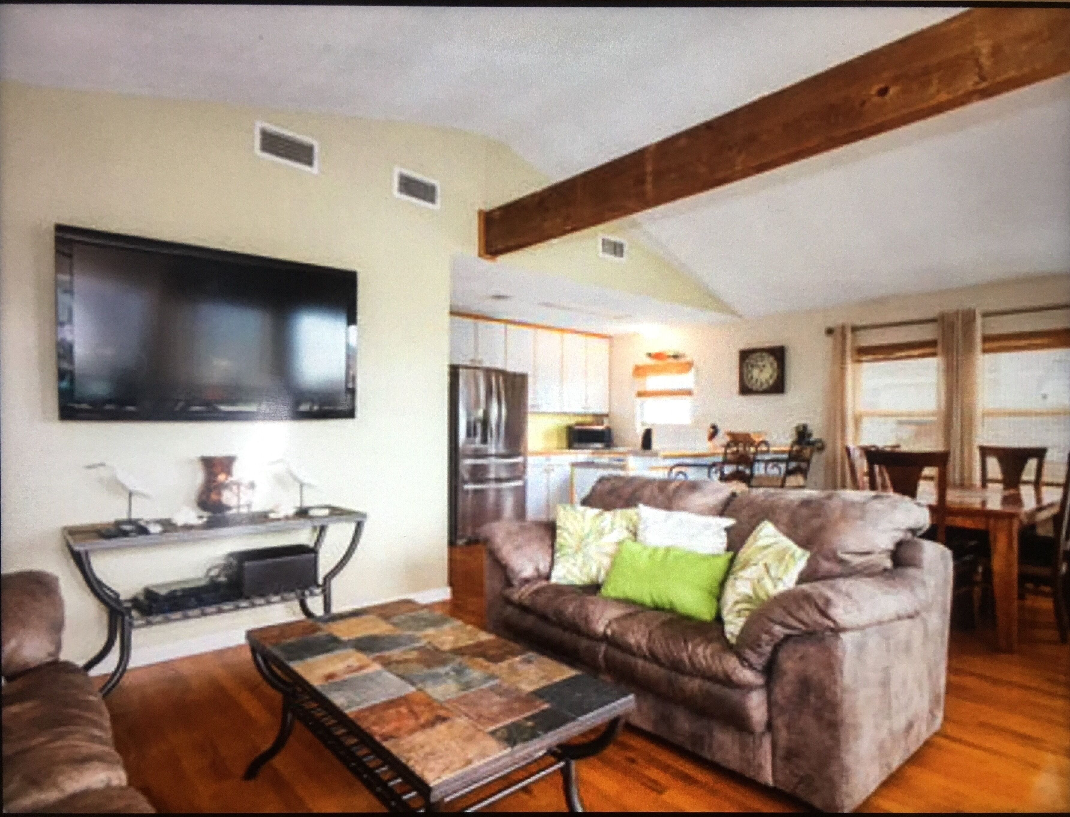 Steps From The Beach and Pet Friendly!  Watch the waves from the great deck!