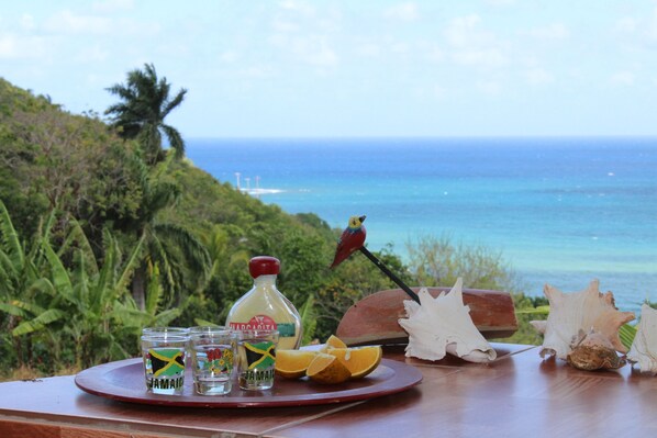Outdoor dining - Free Airport pick-up. private villa with amazing ocean veiw, pool, and maid. (Montego Bay)