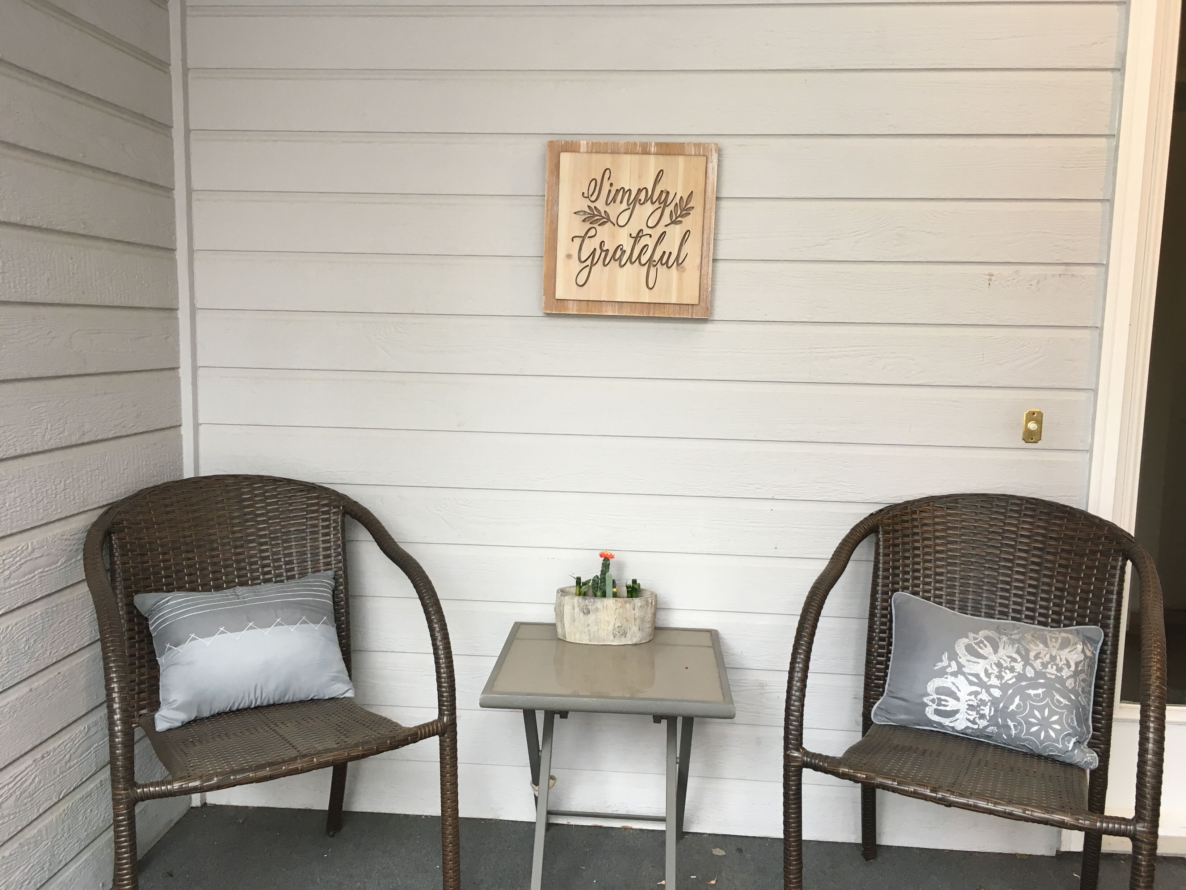 Front porch entrance with seating area
