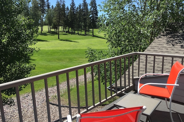 View from upstairs balcony, perfect for watching golfers or deer on the course