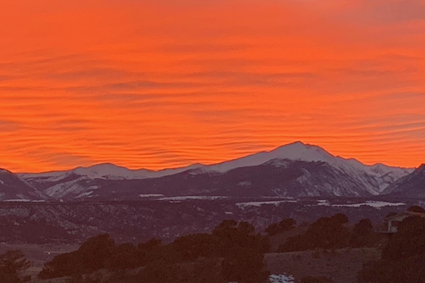 Stunning sunset over the Sawatch Mountains from the front porch