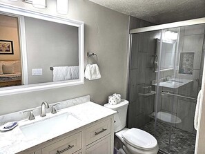 Combined shower/tub, hair dryer