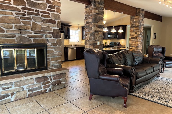 Great inviting area, lots of ceiling-floor windows
2 way fireplace,deck access