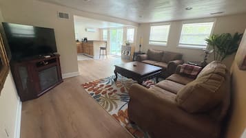 Smart TV, fireplace, books