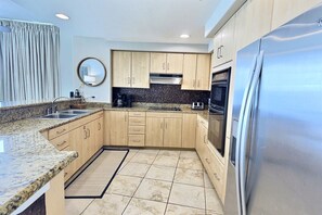 Fridge, microwave, oven, stovetop - Wake Up To The Waves-Stunning 3 Bed, 3 Bath Condo (Gulf Shores)