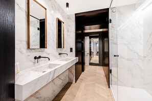 Combined shower/tub, hair dryer, towels, soap
